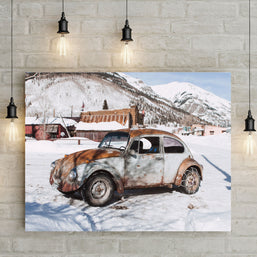 Winter Wonderland Beauty: Scenic Photo of Vintage Beetle in a Quaint Snowy Mountain Village