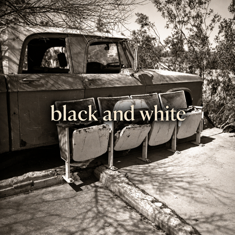 Black and white collection cover with lowercase cream serif text