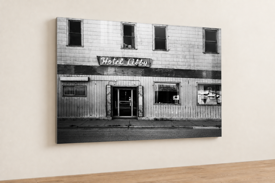 Glossy metal print mockup on cream wall