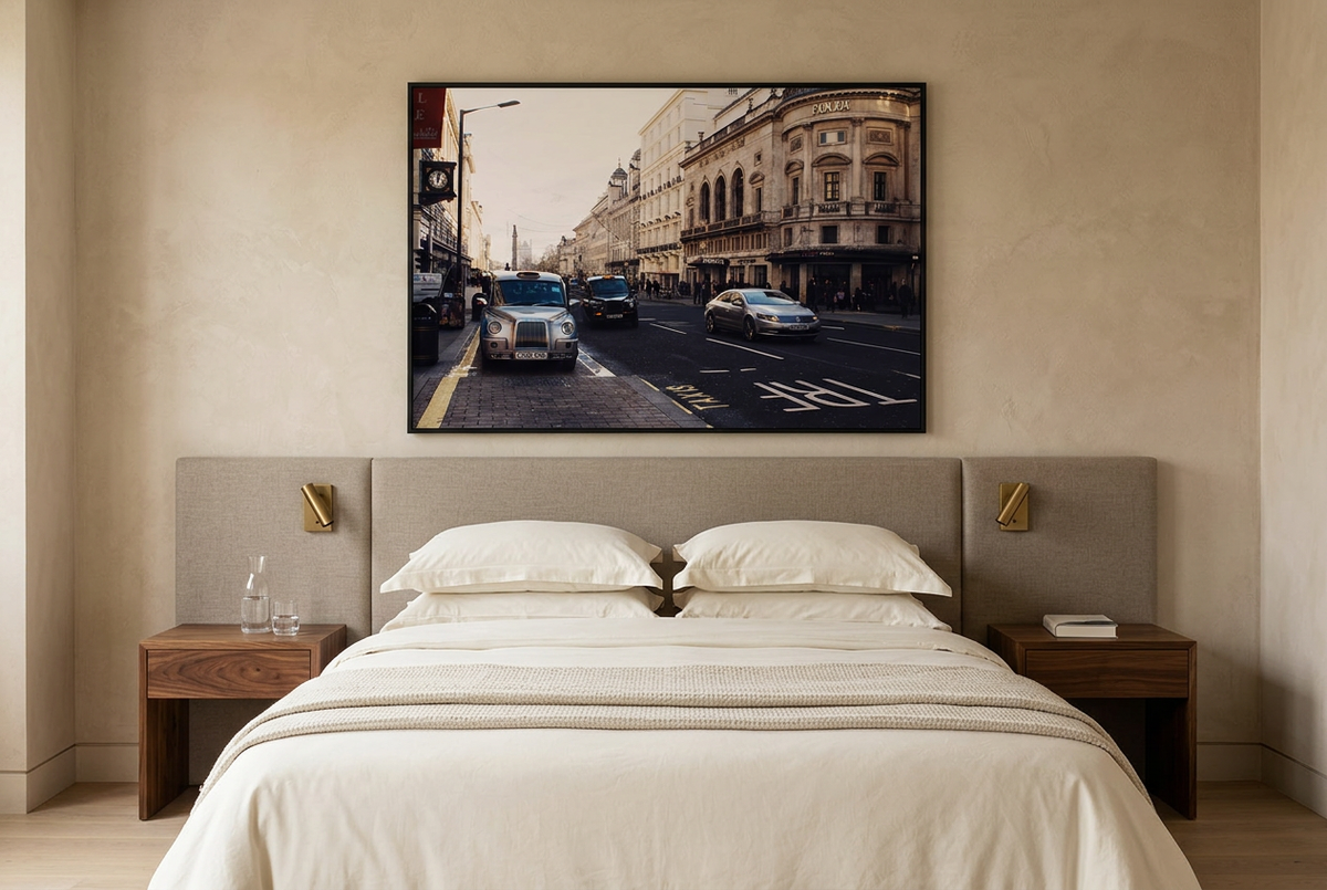 London street photograph framed above a bed in a modern hotel room