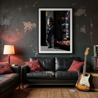 London girl portrait photograph in a black frame in a punk-rock living room