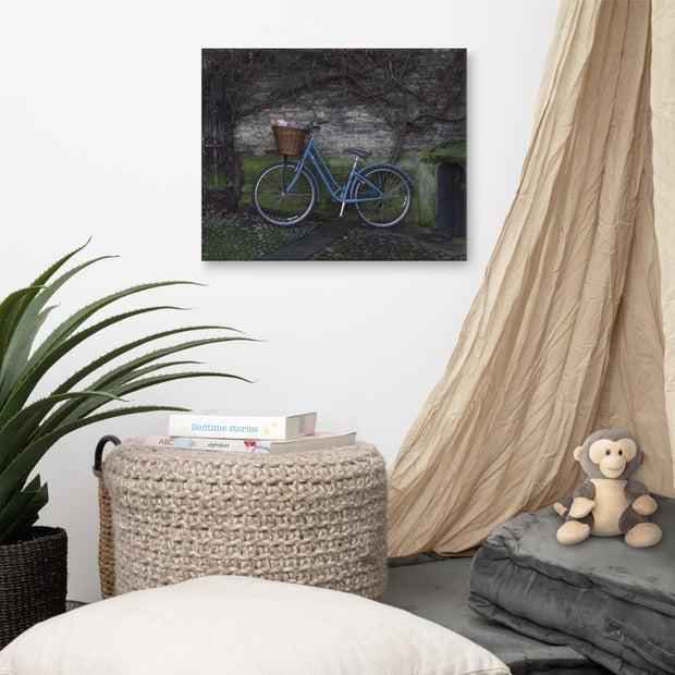 A photo of a canvas print on a white wall in a home