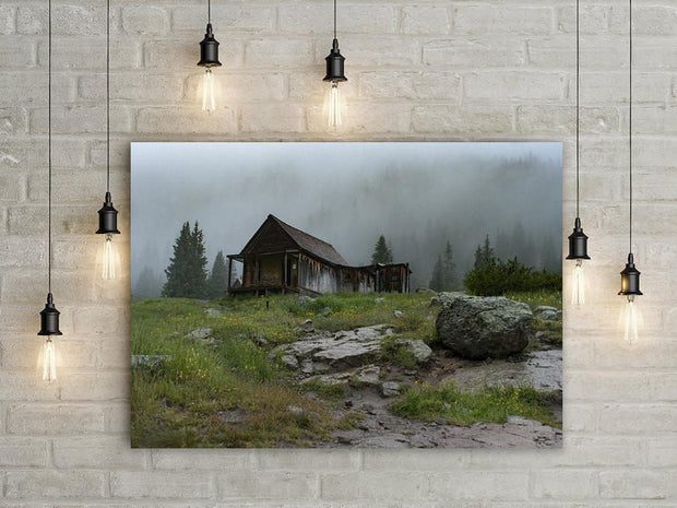 Rustic Cabin Photography Print Hanging on a Wall